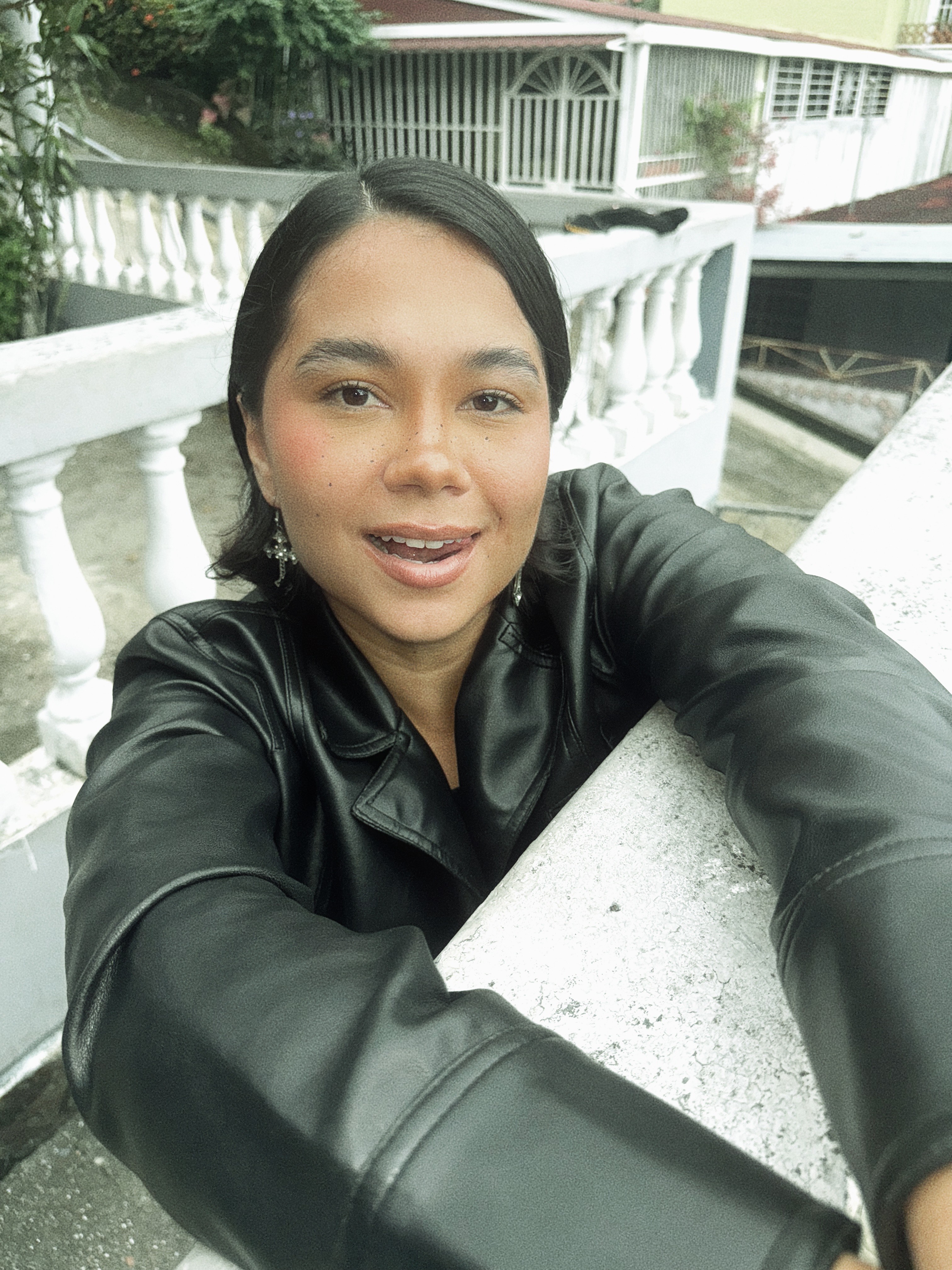 A photo of the Panamanian artist Gavina, looking up into the camera